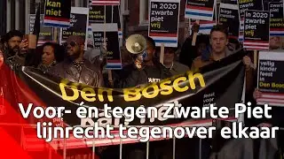 Voor- &eacute;n tegenstanders Zwarte Piet lijnrecht tegenover elkaar in Den Bosch