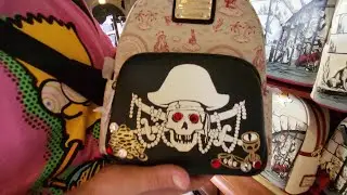 PIRATES OF THE CARIBBEAN LOUNGEFLY BACKPACK $80 - SHOPPING AT MAGIC KINGDOM IN ORLANDO FLORIDA