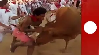 Bull fights back! Uses horns to toss Pamplona revelver into air