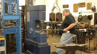 Mace Vitale (JS) forging a bowie at the ABS  hammer-in at NESM