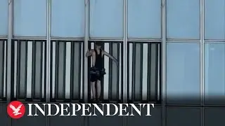 Moment British man climbs to 72nd floor of Seoul skyscraper