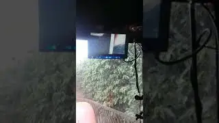 Sistema de camera no trator com Colhedora de caf&eacute; tracionada