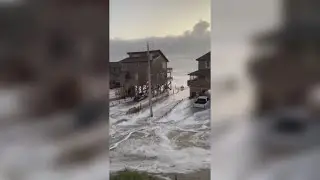 High tide overwash in Outer Banks causes flooding, closing of NC-12