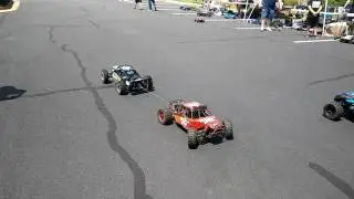 Losi Desert Buggy XL-E 4WD Electric vs Losi Desert Buggy XL 4WD Gas in a tug of war!!!!