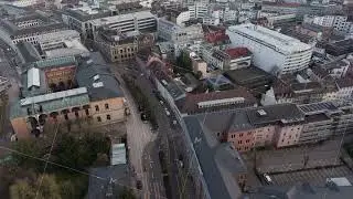 Aerial view flying over the city of Karlsruhe in Germany. Urban landscape with buildings, historic