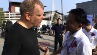 Danish Ambassador Roars into Phnom Penh Heading Historical Biker Convoy
