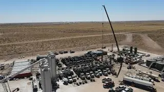 Aerial view of Oil & Gas Well Site During Completions -  Frac Operations - New Mexico, USA