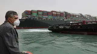 stuck at sea : Cargo ship wedged in suez canal causes traffic jam