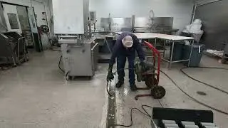UNPLUGGED MEAT/DEP TROUGH DRAIN LINE PLUGGED
