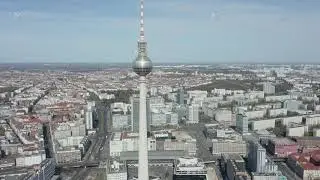 AERIAL: Wide View of Empty Berlin, Germany Alexanderplatz TV Tower with No People or Cars on