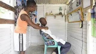 Bienvenu had a nice shave at the barber in Eboundja (Long version)