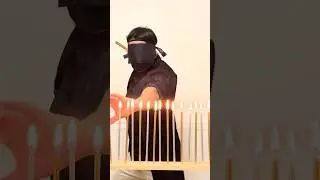 Most candles extinguished with nunchaku strike while blindfolded - 28 by Chirag Lukha 🇬🇧