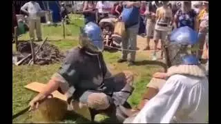 Guys hit each other with frying pans but with TF2 sound effects