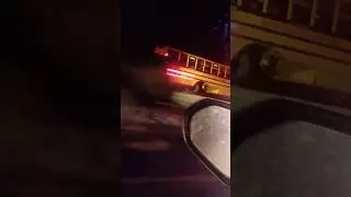 school bus and car crashed into the back wheel , hopefully everyone is okay