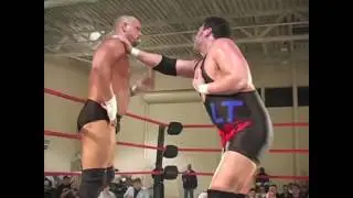 Colt gets shot by Karl Anderson's machine gun