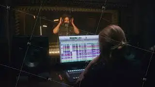 Experienced female sound engineer works with singer