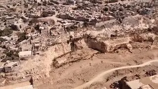 A year after devastating floods and loss of life, residents of Libyan city try to rebuild