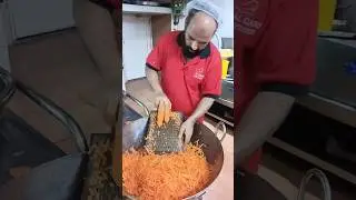 Pakistani chef carrot halwa process in Pakistani restaurant