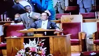 Bishop Phillip Coleman leading a praise break