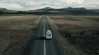 Van driving on a road aerial