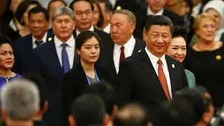 China pledges $124 billion for new Silk Road as champion of globalization