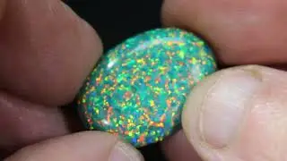Synthetic (lab-created) Opal simulant with green body colour. SYOP41