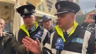 Daphne Caruana Galizia's sisters and journalists confront police outside Casttille