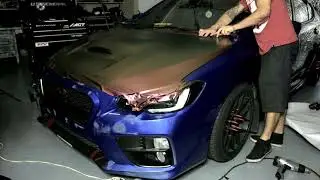 WRX Hood wrapped in Avery Satin Rising Sun Colorshift film