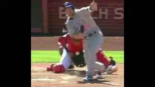 Cardinals catcher YADIER MOLINA gets the ball stuck in his chest protector and can't find the ball