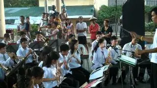 Students  warm up before the show with the master drummer Jun Regalado