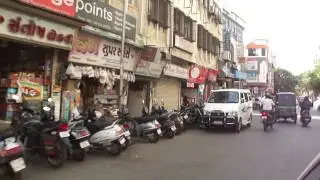 Driving in slow moving traffic jam & then clearer roads in Surat city, Gujarat, India; 23rd May 2012