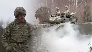 Prince William rides in tank during Estonia visit