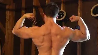 60 lbs (24 kg) pinwheel curls for 10 + back double biceps pose