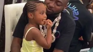 Davido shops new earrings for his daughter Hailey Adeleke in Atlanta jewellery store.