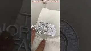 KAWS x The North Face Retro 1996 Nuptse Jacket Moonlight Ivory