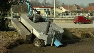 Amphibious Aquatic waterway management machine with six wheels