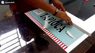 Adesivando placa de PVC