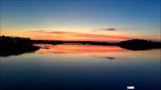 Sunset Over Still Water Turning Gold While The World Pauses And Lets The Moment Stretch On