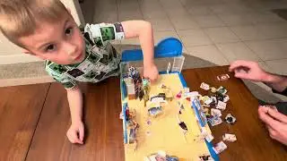 Brax setting up his MINI BRANDS DISNEY - PIXAR STORE.