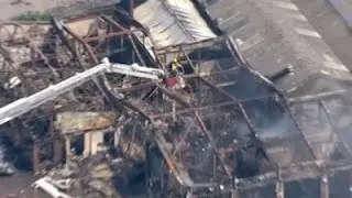 Raw: Fireworks Explode as UK Garden Center Burns
