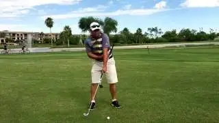 Golf lesson: How to get the hands into proper impact position.