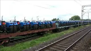 Ярмарки трактора на этом грузовом поезде