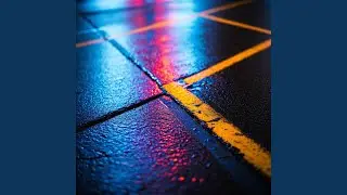 Pavement glistens in the neon light