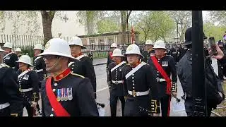 Royal Marines Band returning following the King's Coronation.