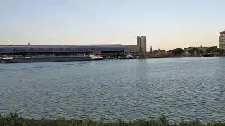 Amsterdam's IJ River Morning: GVB Ferry & Barge at Centraal Station