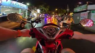 Riding A Motorbike Around Thao Dien, Rain, Traffic. Ho Chi Minh, Vietnam.