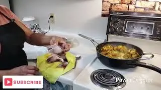 Cooking Jamaican style curry goat and fry fish 