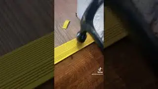 Installing Transition Strip #transition #strip #gold #floor #hammer #nail #smooth