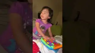 Emma is pretending to be a cashier