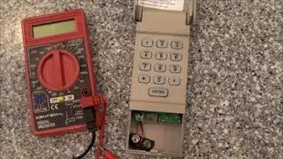 Fix wireless keyless garage door opener remote keypad - poor battery connection on Liftmaster 376LM